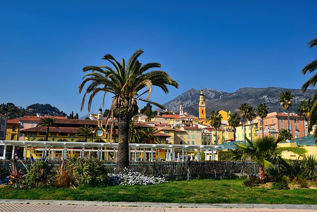 French Riviera coastal town with palm trees, Mediterranean architecture and sunny landscapes on the Côte d'Azur.